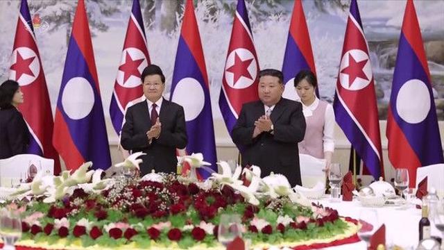 김정은, 라오스 창건 50주년 축전…