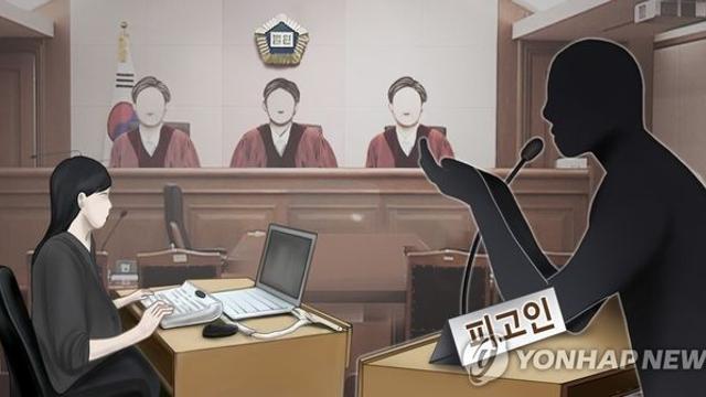 뇌물받고 무죄 예상했나?…수의 대신 정장 입은 익산시 공무원