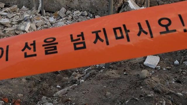 “폭발물 추정 물체” 112 신고...청주 밭에서 81㎜ 박격포탄 발견