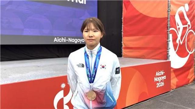 [아시안게임] 한국에 첫 메달 안긴 신지은 